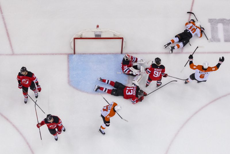 Jan 18, 2025; Newark, New Jersey, USA; Philadelphia Flyers right wing Bobby Brink (10) celebrates his goal against the New Jersey Devils during the third period at Prudential Center. Mandatory Credit: Ed Mulholland-Imagn Images