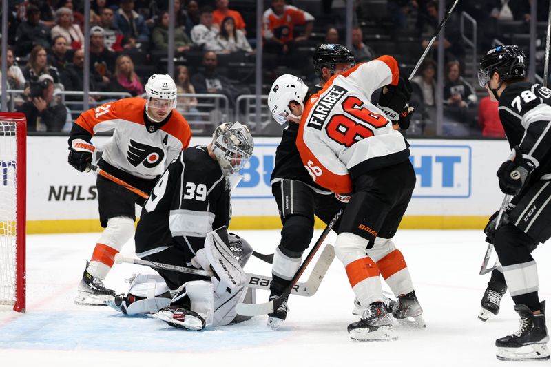 Nov 11, 2023; Los Angeles, California, USA;  Philadelphia Flyers left wing Joel Farabee (86) attempts to score as Los Angeles Kings goaltender Cam Talbot (39) defends the goal during the third period at Crypto.com Arena. Mandatory Credit: Kiyoshi Mio-USA TODAY Sports