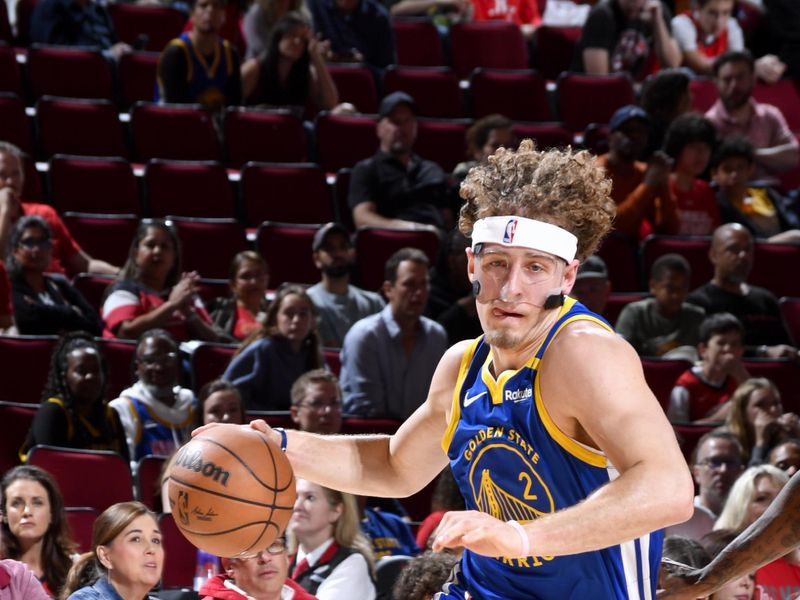 HOUSTON, TX - NOVEMBER 2:  Brandin Podziemski #2 of the Golden State Warriors drives to the basket during the game on October 22, 2024 at the Toyota Center in Houston, Texas. NOTE TO USER: User expressly acknowledges and agrees that, by downloading and or using this photograph, User is consenting to the terms and conditions of the Getty Images License Agreement. Mandatory Copyright Notice: Copyright 2024 NBAE (Photo by Logan Riely/NBAE via Getty Images)