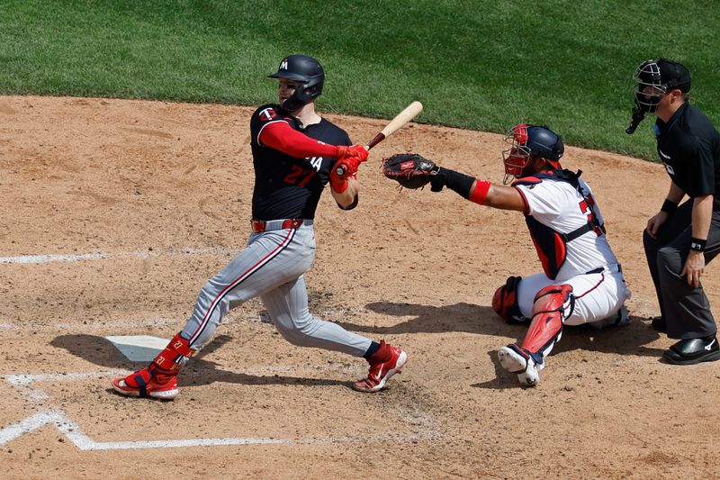 May 22, 2024; Washington, District of Columbia, USA; Minnesota Twins catcher Ryan Jeffers (27) hits an RBI single against the Washington Nationals during the ninth inning at Nationals Park. Mandatory Credit: Geoff Burke-USA TODAY Sports