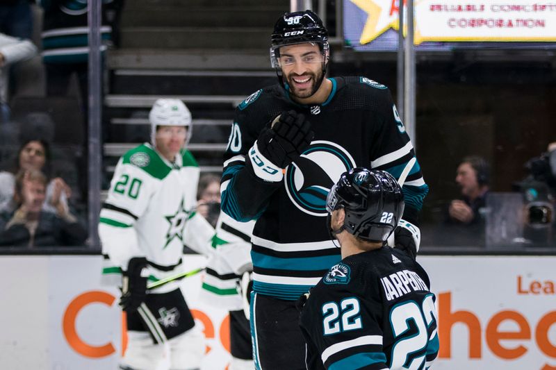 Mar 5, 2024; San Jose, California, USA; San Jose Sharks center Ryan Carpenter (22) is congratulated by right wing Justin Bailey (90) after he scored against the Dallas Stars during the second period at SAP Center at San Jose. Mandatory Credit: John Hefti-USA TODAY Sports