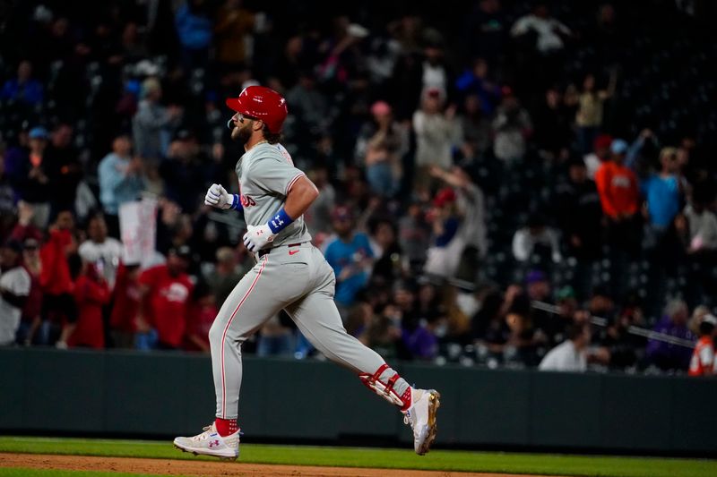 May 25, 2024; Denver, Colorado, USA; Philadelphia Phillies first base Bryce Harper (3) rounds the bases after hi three-run homer in the 9th inning at Coors Field. The Philadelphia Phillies defeated the Colorado Rockies 8-4.  Mandatory Credit: Michael Madrid-USA TODAY Sports