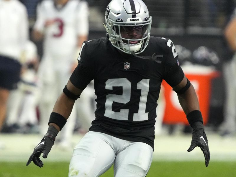 Las Vegas Raiders cornerback Amik Robertson (21) drops back in coverage during an NFL football game against the Houston Texans, Sunday, Oct 23, 2022, in Las Vegas. (AP Photo/Rick Scuteri)