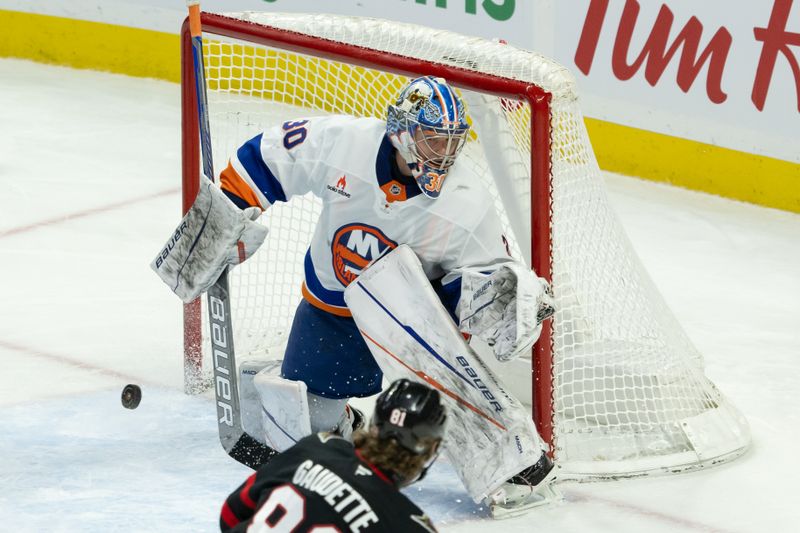 Dec 8, 2024; Ottawa, Ontario, CAN; New York Islanders goalie Ilya Sorokin (30) makes a save on a shot from Ottawa Senators right wing Adam Gaudette (81) in the third period at the Canadian Tire Centre. Mandatory Credit: Marc DesRosiers-Imagn Images