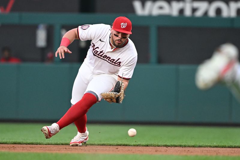 Aug 26, 2024; Washington, District of Columbia, USA; Washington Nationals third baseman Andres Chaparro (19) fields a ground ball against the New York Yankees during the second inning at Nationals Park. Mandatory Credit: Rafael Suanes-USA TODAY Sports