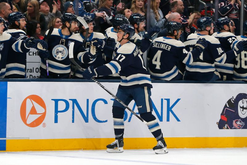 Dec 31, 2025; Columbus, Ohio, USA; Columbus Blue Jackets left wing Mason Marchmnet (17) celebrates his goal against the New Jersey Devils during the first period at Nationwide Arena. Mandatory Credit: Russell LaBounty-Imagn Images