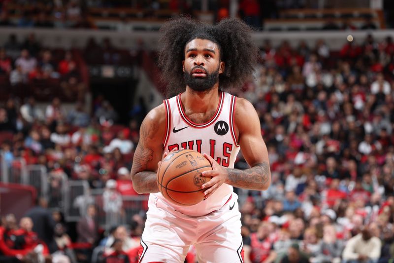 CHICAGO, IL - OCTOBER 18: Coby White #0 of the Chicago Bulls shoots a free throw during the game against the Cleveland Cavaliers on October 18, 2024 at United Center in Chicago, Illinois. NOTE TO USER: User expressly acknowledges and agrees that, by downloading and or using this photograph, User is consenting to the terms and conditions of the Getty Images License Agreement. Mandatory Copyright Notice: Copyright 2023 NBAE (Photo by Jeff Haynes/NBAE via Getty Images)