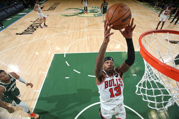 MILWAUKEE, WI - DECEMBER 11:  Torrey Craig #13 of Chicago Bulls grabs the rebound during the game  on December 11, 2023 at the Fiserv Forum Center in Milwaukee, Wisconsin. NOTE TO USER: User expressly acknowledges and agrees that, by downloading and or using this Photograph, user is consenting to the terms and conditions of the Getty Images License Agreement. Mandatory Copyright Notice: Copyright 2023 NBAE (Photo by Gary Dineen/NBAE via Getty Images).