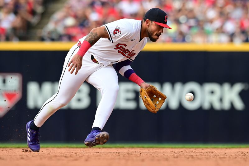 Jun 1, 2024; Cleveland, Ohio, USA; Cleveland Guardians second baseman Gabriel Arias (13) fields a ball hit by Washington Nationals first baseman Joey Meneses (45) during the ninth inning at Progressive Field. Mandatory Credit: Ken Blaze-USA TODAY Sports