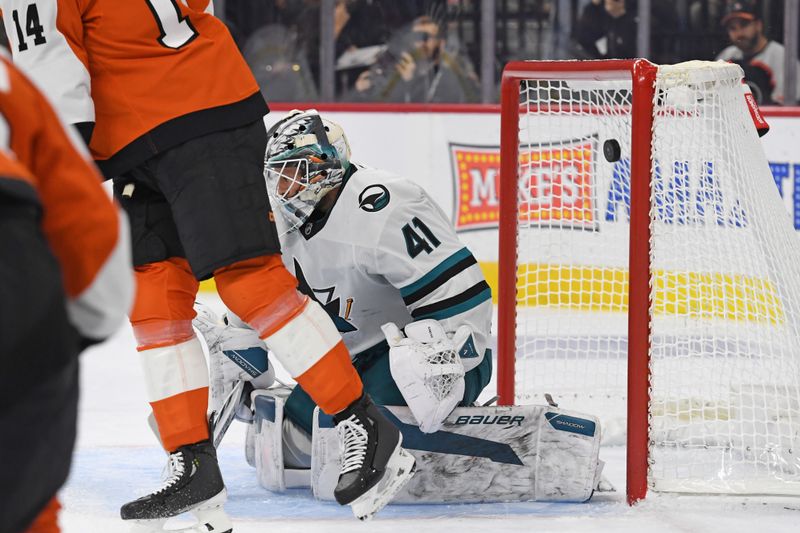 Nov 11, 2024; Philadelphia, Pennsylvania, USA; San Jose Sharks goaltender Vitek Vanecek (41) can't stop shot by Philadelphia Flyers right wing Travis Konecny (11) (not pictured) during the first period at Wells Fargo Center. Mandatory Credit: Eric Hartline-Imagn Images