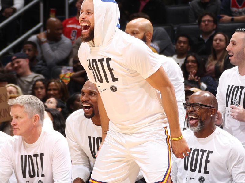 WASHINGTON, DC -? NOVEMBER 04:  Stephen Curry #30 of the Golden State Warriors =celebrates from the bench during the game against the Washington Wizards on November 04 2024 at Capital One Arena in Washington, DC. NOTE TO USER: User expressly acknowledges and agrees that, by downloading and or using this Photograph, user is consenting to the terms and conditions of the Getty Images License Agreement. Mandatory Copyright Notice: Copyright 2024 NBAE (Photo by Kenny Giarla/NBAE via Getty Images)