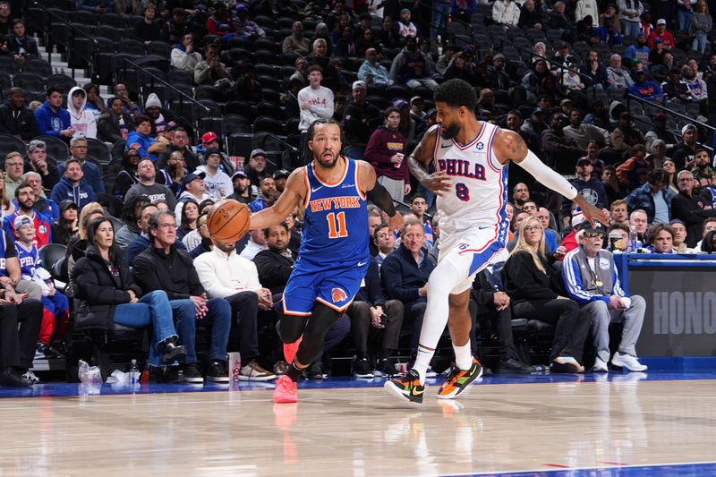 PHILADELPHIA, PA - JANUARY 15: Jalen Brunson #11 of the New York Knicks drives to the basket during the game against the Philadelphia 76ers on January 15, 2025 at the Wells Fargo Center in Philadelphia, Pennsylvania NOTE TO USER: User expressly acknowledges and agrees that, by downloading and/or using this Photograph, user is consenting to the terms and conditions of the Getty Images License Agreement. Mandatory Copyright Notice: Copyright 2025 NBAE (Photo by Jesse D. Garrabrant/NBAE via Getty Images)