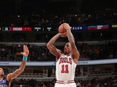 CHICAGO, IL - DECEMBER 6: DeMar DeRozan #11 of the Chicago Bulls shoots the ball during the game against the Charlotte Hornets on December 6, 2023 at the United Center in Chicago, Illinois. NOTE TO USER: User expressly acknowledges and agrees that, by downloading and or using this Photograph, user is consenting to the terms and conditions of the Getty Images License Agreement. Mandatory Copyright Notice: Copyright 2023 NBAE (Photo by Gary Dineen/NBAE via Getty Images).