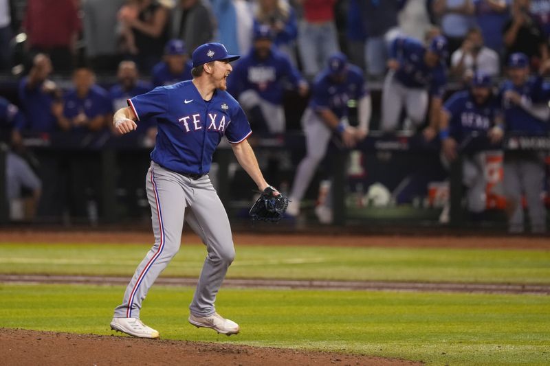 Nov 1, 2023; Phoenix, AZ, USA; Texas Rangers relief pitcher Josh Sborz (66) celebrates after defeating the Arizona Diamondbacks to win the World Series in game five of the 2023 World Series at Chase Field. Mandatory Credit: Joe Camporeale-USA TODAY Sports