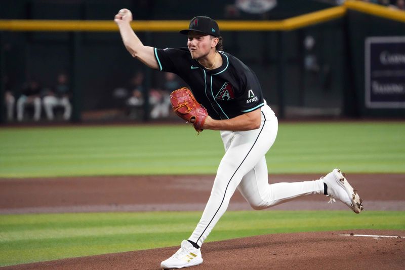 Jul 27, 2024; Phoenix, Arizona, USA; Arizona Diamondbacks pitcher Brandon Pfaadt (32) pitches against the Pittsburgh Pirates during the first inning at Chase Field. Mandatory Credit: Joe Camporeale-USA TODAY Sports