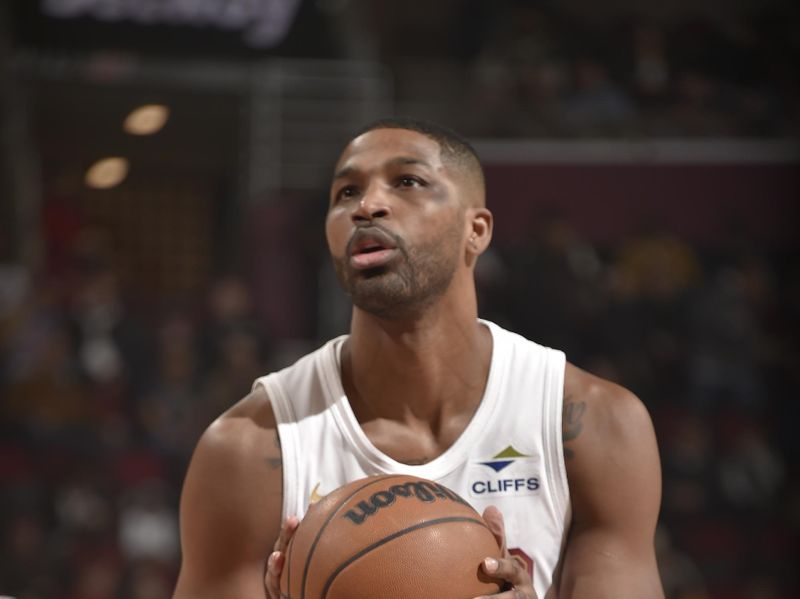 CLEVELAND, OH - DECEMBER 13: Tristan Thompson #13 of the Cleveland Cavaliers shoots a free throw during the game against the Washington Wizards on December 13, 2024 at Rocket Mortgage FieldHouse in Cleveland, Ohio. NOTE TO USER: User expressly acknowledges and agrees that, by downloading and/or using this Photograph, user is consenting to the terms and conditions of the Getty Images License Agreement. Mandatory Copyright Notice: Copyright 2024 NBAE (Photo by David Liam Kyle/NBAE via Getty Images)