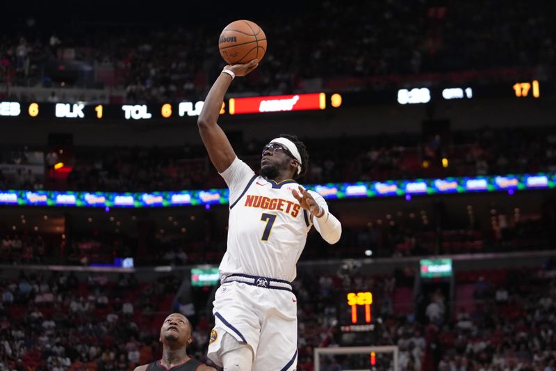 MIAMI, FL - MARCH 13: Reggie Jackson #7 of the Denver Nuggets shoots the ball during the game against the Miami Heat on March 13, 2024 at Kaseya Center in Miami, Florida. NOTE TO USER: User expressly acknowledges and agrees that, by downloading and or using this Photograph, user is consenting to the terms and conditions of the Getty Images License Agreement. Mandatory Copyright Notice: Copyright 2024 NBAE (Photo by Eric Espada/NBAE via Getty Images)