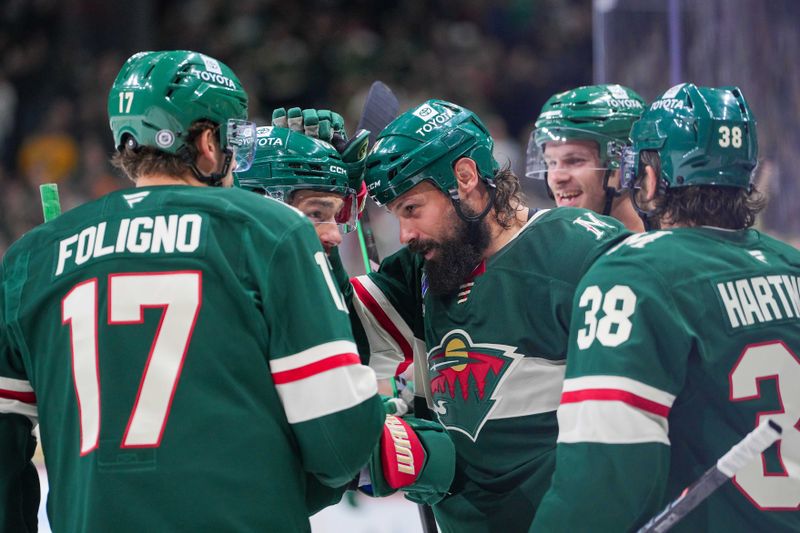 Nov 5, 2024; Saint Paul, Minnesota, USA; Minnesota Wild defenseman Zach Bogosian (24) celebrates his goal against the Los Angeles Kings in the second period at Xcel Energy Center. Mandatory Credit: Brad Rempel-Imagn Images