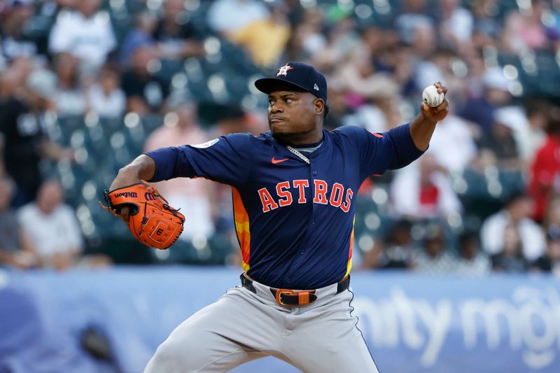 Jun 18, 2024; Chicago, Illinois, USA; Houston Astros starting pitcher Framber Valdez (59) delivers a pitch against the Chicago White Sox during the first inning at Guaranteed Rate Field. Mandatory Credit: Kamil Krzaczynski-USA TODAY Sports