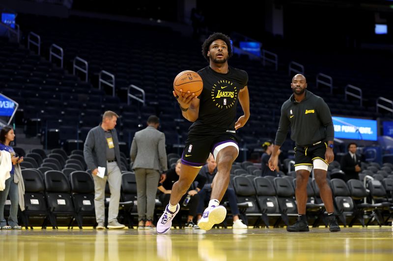 SAN FRANCISCO, CALIFORNIA - OCTOBER 18: Bronny James #9 of the Los Angeles Lakers warms up before their preseason game against the Golden State Warriors at Chase Center on October 18, 2024 in San Francisco, California.  NOTE TO USER: User expressly acknowledges and agrees that, by downloading and/or using this photograph, user is consenting to the terms and conditions of the Getty Images License Agreement.  (Photo by Ezra Shaw/Getty Images)