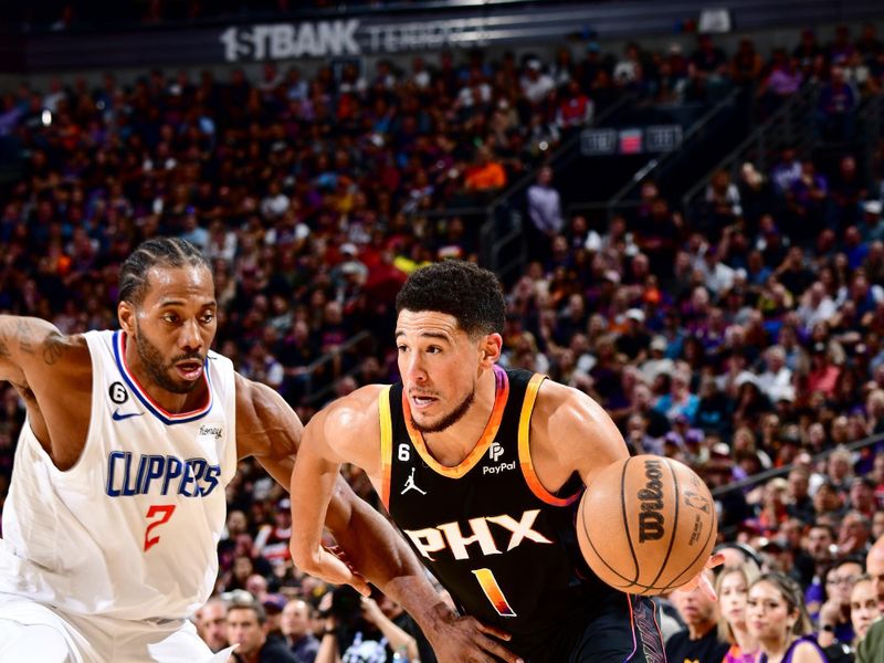 PHOENIX, AZ - APRIL 18: Devin Booker #1 of the Phoenix Suns dribbles the ball during the game against the LA Clippers during Round 1 Game 2 of the 2023 NBA Playoffs on April 18, 2023 at Footprint Center in Phoenix, Arizona. NOTE TO USER: User expressly acknowledges and agrees that, by downloading and or using this photograph, user is consenting to the terms and conditions of the Getty Images License Agreement. Mandatory Copyright Notice: Copyright 2023 NBAE (Photo by Barry Gossage/NBAE via Getty Images)