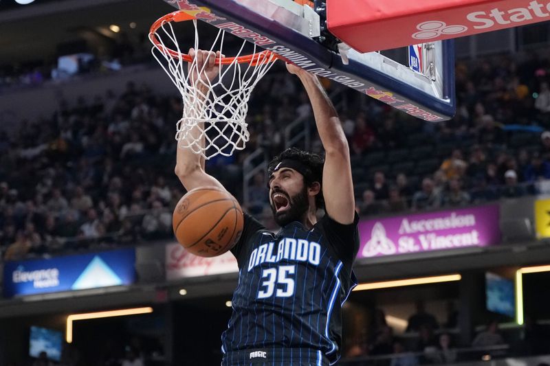 INDIANAPOLIS, INDIANA - NOVEMBER 06: Goga Bitadze #35 of the Orlando Magic dunks the ball in the first quarter against the Indiana Pacers at Gainbridge Fieldhouse on November 06, 2024 in Indianapolis, Indiana. NOTE TO USER: User expressly acknowledges and agrees that, by downloading and or using this photograph, User is consenting to the terms and conditions of the Getty Images License Agreement. (Photo by Dylan Buell/Getty Images)