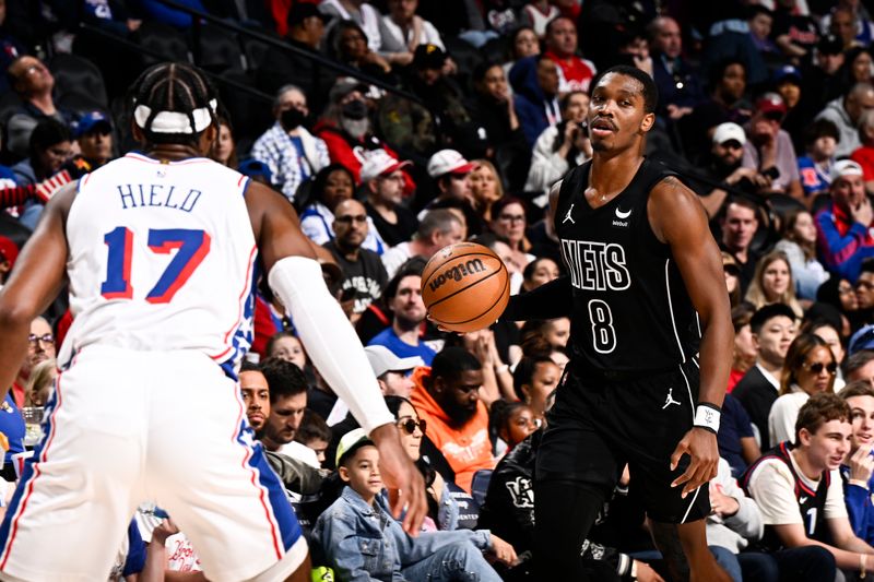 PHILADELPHIA, PA - APRIL 14:  Lonnie Walker IV #8 of the Brooklyn Nets handles the ball during the game against the Philadelphia 76ers on April 14, 2024 at the Wells Fargo Center in Philadelphia, Pennsylvania NOTE TO USER: User expressly acknowledges and agrees that, by downloading and/or using this Photograph, user is consenting to the terms and conditions of the Getty Images License Agreement. Mandatory Copyright Notice: Copyright 2024 NBAE (Photo by David Dow/NBAE via Getty Images)