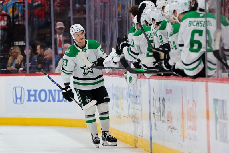 Nov 1, 2025; Sunrise, Florida, USA; Dallas Stars center Wyatt Johnston (53) celebrates with teammates after scoring against the Florida Panthers during the second period at Amerant Bank Arena. Mandatory Credit: Sam Navarro-Imagn Images