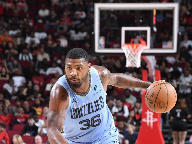 HOUSTON, TX - OCTOBER 25: Marcus Smart #36 of the Memphis Grizzlies dribbles the ball during the game against the Houston Rockets on October 25, 2024 at the Toyota Center in Houston, Texas. NOTE TO USER: User expressly acknowledges and agrees that, by downloading and or using this photograph, User is consenting to the terms and conditions of the Getty Images License Agreement. Mandatory Copyright Notice: Copyright 2024 NBAE (Photo by Logan Riely/NBAE via Getty Images)