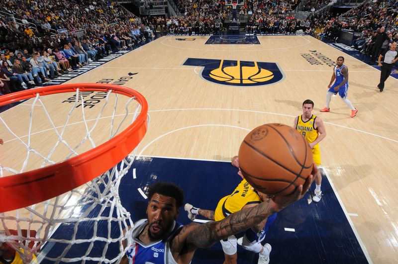 INDIANAPOLIS, IN - FEBRUARY 2: Malik Monk #0 of the Sacramento Kings shoots the ball during the game against the Indiana Pacers on February 2, 2024 at Gainbridge Fieldhouse in Indianapolis, Indiana. NOTE TO USER: User expressly acknowledges and agrees that, by downloading and or using this Photograph, user is consenting to the terms and conditions of the Getty Images License Agreement. Mandatory Copyright Notice: Copyright 2024 NBAE (Photo by Ron Hoskins/NBAE via Getty Images)