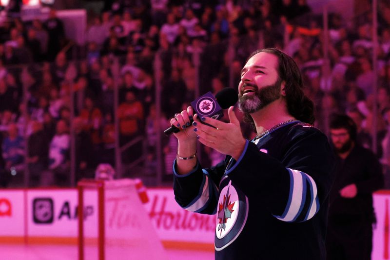 Mar 11, 2024; Winnipeg, Manitoba, CAN; Soulbear sings the national anthems at a game between the Winnipeg Jets and the Washington Capitals at Canada Life Centre. Mandatory Credit: James Carey Lauder-USA TODAY Sports