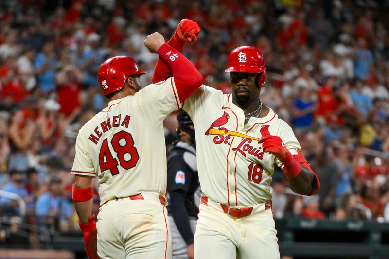 Sep 21, 2024; St. Louis, Missouri, USA;  St. Louis Cardinals right fielder Jordan Walker (18) celebrates with catcher Ivan Herrera (48) after hitting a two run home run against the Cleveland Guardians during the fourth inning at Busch Stadium. Mandatory Credit: Jeff Curry-Imagn Images