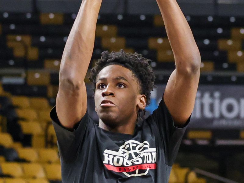 Jan 25, 2023; Orlando, Florida, USA; Houston Cougars guard Terrance Arceneaux (23) warms up before the game against the UCF Knights at Addition Financial Arena. Mandatory Credit: Mike Watters-USA TODAY Sports