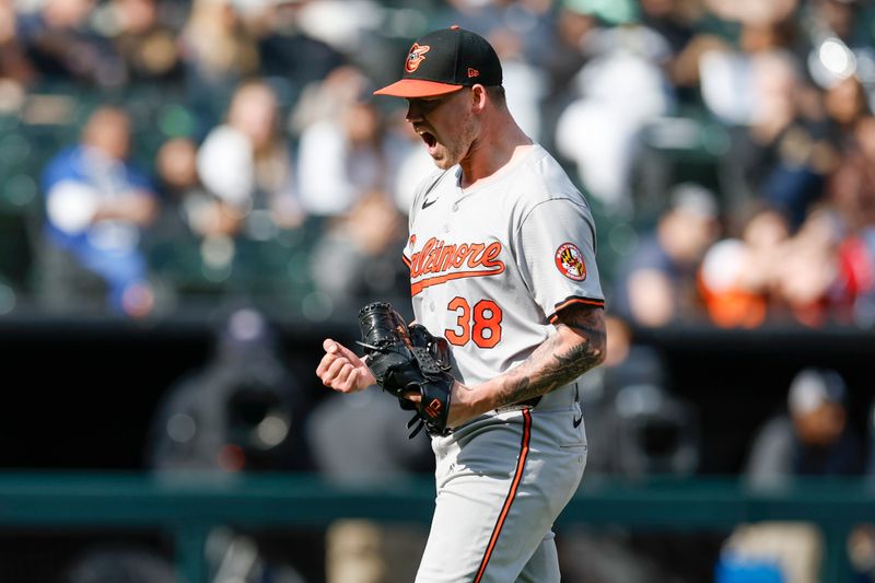 May 26, 2024; Chicago, Illinois, USA; Baltimore Orioles starting pitcher Kyle Bradish (38) reacts after striking out Chicago White Sox third baseman Bryan Ramos during the seventh inning at Guaranteed Rate Field. Mandatory Credit: Kamil Krzaczynski-USA TODAY Sports