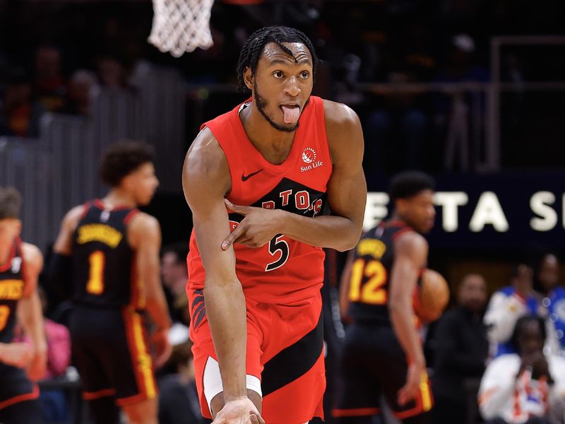 ATLANTA, GEORGIA - FEBRUARY 23: Immanuel Quickley #5 of the Toronto Raptors reacts after a three pointer during the first quarter against the Atlanta Hawks at State Farm Arena on February 23, 2024 in Atlanta, Georgia. NOTE TO USER: User expressly acknowledges and agrees that, by downloading and or using this photograph, User is consenting to the terms and conditions of the Getty Images License Agreement. (Photo by Todd Kirkland/Getty Images)