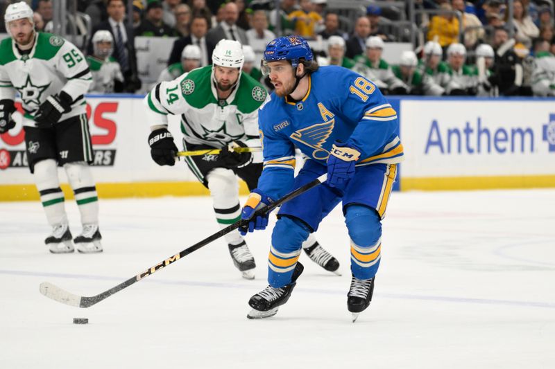 Jan 25, 2025; St. Louis, Missouri, USA; St. Louis Blues center Robert Thomas (18) skates against the Dallas Stars during the second period at Enterprise Center. Mandatory Credit: Jeff Le-Imagn Images