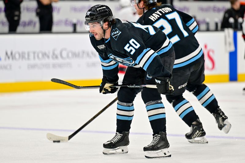 Jan 7, 2026; Salt Lake City, Utah, USA; Utah Mammoth defenseman Sean Durzi (50) warms up before the game against the Ottawa Senators at Delta Center. Mandatory Credit: Peter Creveling-Imagn Images