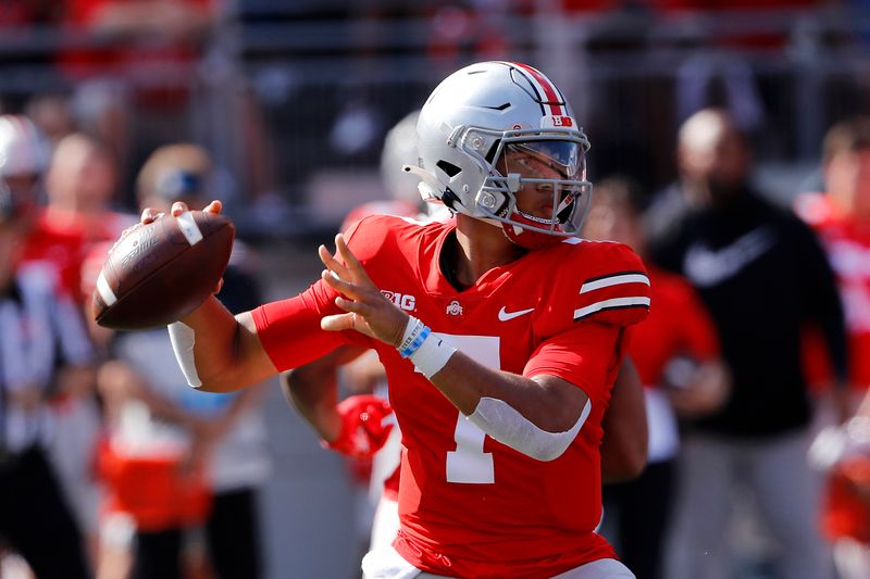 Sep 18, 2021; Columbus, Ohio, USA; Ohio State Buckeyes quarterback C.J. Stroud (7) throws a pass during the first quarter against the Tulsa Golden Hurricane at Ohio Stadium. Mandatory Credit: Joseph Maiorana-USA TODAY Sports