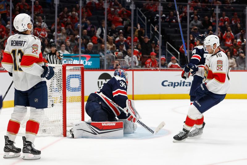 Nov 8, 2023; Washington, District of Columbia, USA; Florida Panthers center Sam Reinhart (13) celebrates after scoring the game winning goal on Washington Capitals goaltender Darcy Kuemper (35) in overtime at Capital One Arena. Mandatory Credit: Geoff Burke-USA TODAY Sports