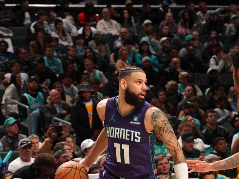 CHARLOTTE, NC - JANUARY 19: Cody Martin #11 of the Charlotte Hornets handles the ball during the game against the San Antonio Spurs on January 19, 2024 at Spectrum Center in Charlotte, North Carolina. NOTE TO USER: User expressly acknowledges and agrees that, by downloading and or using this photograph, User is consenting to the terms and conditions of the Getty Images License Agreement. Mandatory Copyright Notice: Copyright 2024 NBAE (Photo by Kent Smith/NBAE via Getty Images)