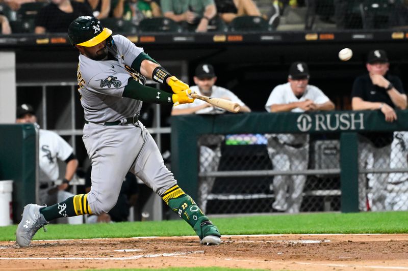 Aug 24, 2023; Chicago, Illinois, USA;  Oakland Athletics catcher Shea Langeliers (23) hits a three run homerun against the Chicago White Sox during the fourth inning at Guaranteed Rate Field. Mandatory Credit: Matt Marton-USA TODAY Sports