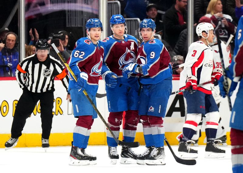 Jan 24, 2023; Denver, Colorado, USA; Colorado Avalanche left wing Artturi Lehkonen (62) celebrates his goal with center Nathan MacKinnon (29) and center Evan Rodrigues (9) in the first period against the Washington Capitals at Ball Arena. Mandatory Credit: Ron Chenoy-USA TODAY Sports