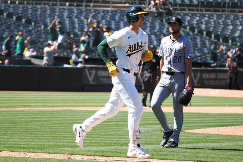 May 23, 2024; Oakland, California, USA; Oakland Athletics pinch hitter Tyler Soderstrom (21) earns a walk against Colorado Rockies relief pitcher Peter Lambert (20) for a walk-off win during the eleventh inning at Oakland-Alameda County Coliseum. Mandatory Credit: Kelley L Cox-USA TODAY Sports