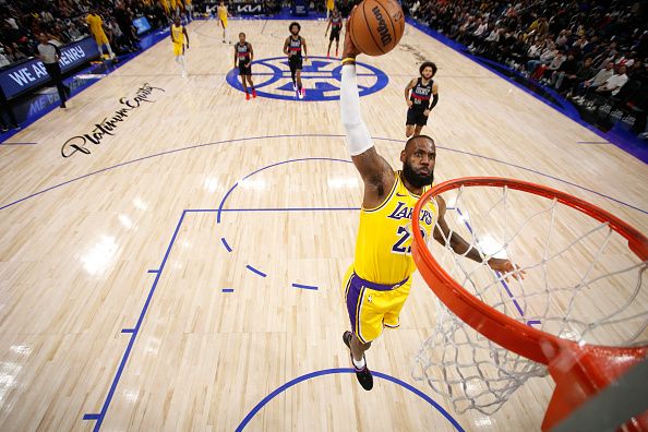 DETROIT, MI - NOVEMBER 29: LeBron James #23 of the Los Angeles Lakers dunks the ball during the game against the Detroit Pistons on November 29, 2023 at Little Caesars Arena in Detroit, Michigan. NOTE TO USER: User expressly acknowledges and agrees that, by downloading and/or using this photograph, User is consenting to the terms and conditions of the Getty Images License Agreement. Mandatory Copyright Notice: Copyright 2023 NBAE (Photo by Brian Sevald/NBAE via Getty Images)