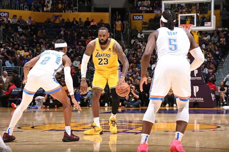 LOS ANGELES, CA - MARCH 4: LeBron James #23 of the Los Angeles Lakers dribbles the ball during the game against the Oklahoma City Thunder on March 4, 2024 at Crypto.Com Arena in Los Angeles, California. NOTE TO USER: User expressly acknowledges and agrees that, by downloading and/or using this Photograph, user is consenting to the terms and conditions of the Getty Images License Agreement. Mandatory Copyright Notice: Copyright 2024 NBAE (Photo by Andrew D. Bernstein/NBAE via Getty Images)