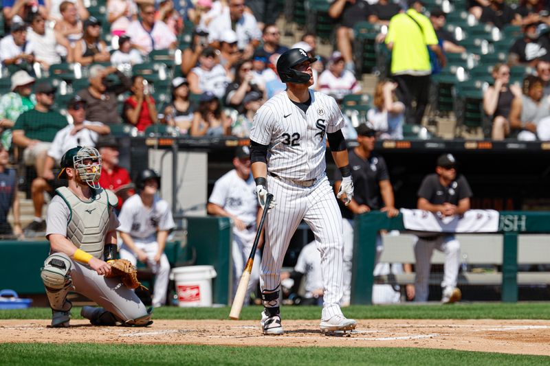 Sep 15, 2024; Chicago, Illinois, USA; Chicago White Sox outfielder Gavin Sheets (32) watches his a two-run home run against the Oakland Athletics during the first inning at Guaranteed Rate Field. Mandatory Credit: Kamil Krzaczynski-Imagn Images