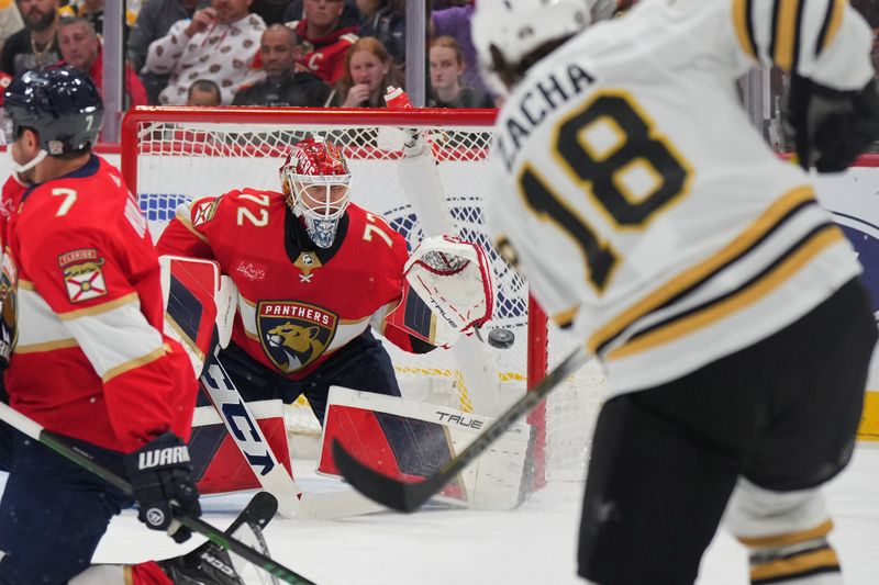 Mar 26, 2024; Sunrise, Florida, USA; Boston Bruins center Pavel Zacha (18) takes a shot on goal as Florida Panthers goaltender Sergei Bobrovsky (72) keeps his eye on the puck in the first period at Amerant Bank Arena. Mandatory Credit: Jim Rassol-USA TODAY Sports