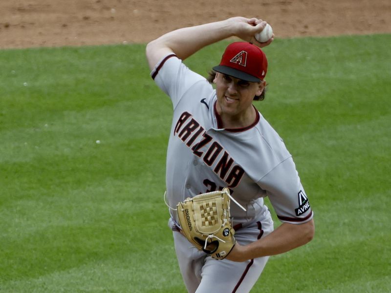 Jun 11, 2023; Detroit, Michigan, USA;  Arizona Diamondbacks relief pitcher Andrew Chafin (57) pitches in the ninth inning against the Detroit Tigers at Comerica Park. Mandatory Credit: Rick Osentoski-USA TODAY Sports