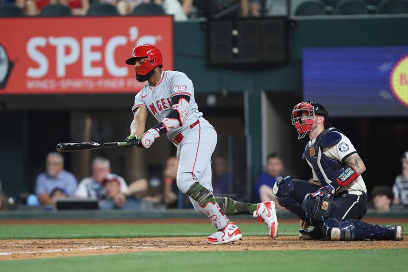 May 17, 2024; Arlington, Texas, USA; Los Angeles Angels right fielder Jo Adell (7) hits a two-run single in the ninth inning against the Texas Rangers at Globe Life Field. Mandatory Credit: Tim Heitman-USA TODAY Sports