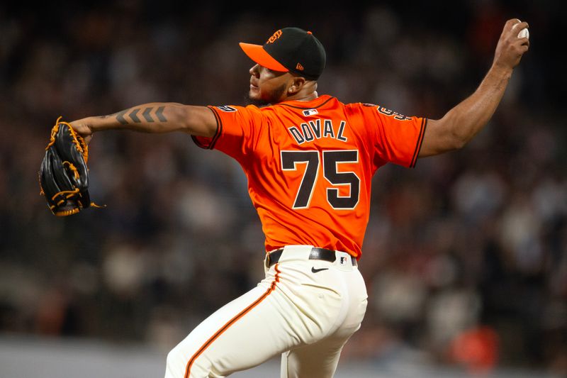 Sep 27, 2024; San Francisco, California, USA; San Francisco Giants pitcher Camilo Doval (75) delivers a pitch against the St. Louis Cardinals during the seventh inning at Oracle Park. Mandatory Credit: D. Ross Cameron-Imagn Images